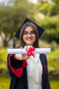 woman holding a diploma